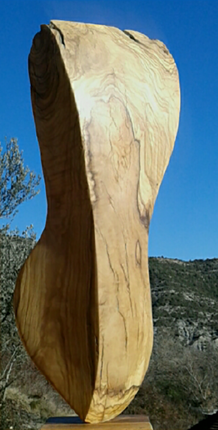 escultura de madera de olvio